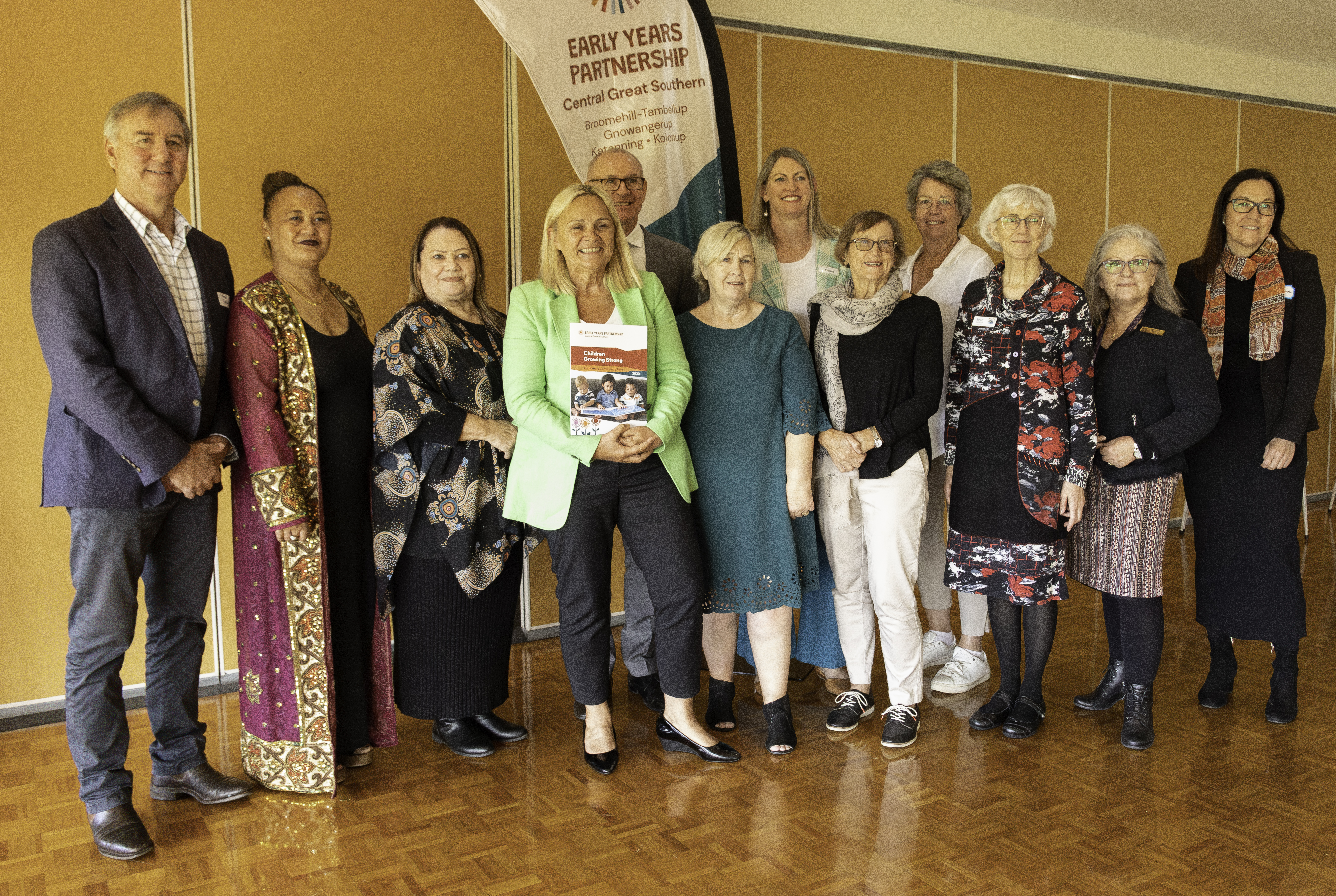 Community group photo with Sabine Winton at launch event