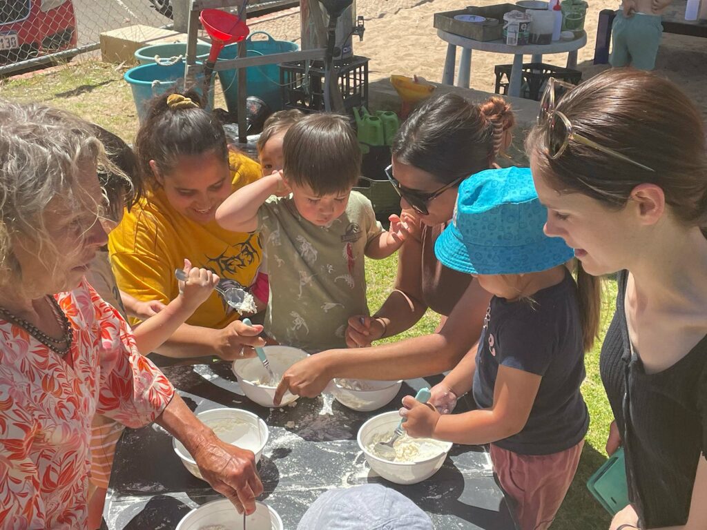 Children and parents cooking together